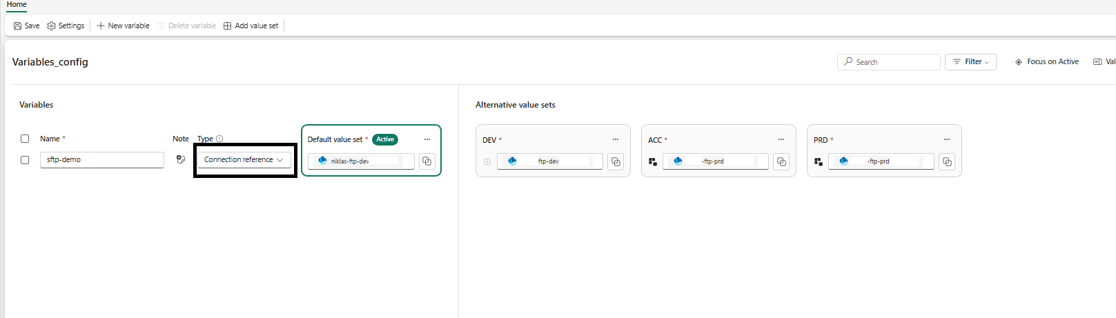 Fabric Variable Library named Variables_config with a sftp-demo variable of type Connection reference, an Active default value set pointing at the DEV SFTP connection, and DEV, ACC, and PRD value sets each overriding it with their own connection